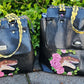 Both sizes of Solasta with a Raptor surrounded Roses on black with yellow Danger strapping.